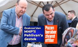 Özakcan’dan MHP’li Pehlivan’a destek; Pazarı beraber ziyaret ettiler