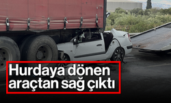 Hurdaya dönen araçtan sağ çıktı