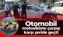 Otomobil, motosiklete çarpıp karşı şeride geçti