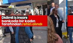 Didimli iş insanı bankada bir kadın tarafından rehin alındı