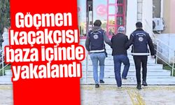 Göçmen kaçakçısı baza içinde yakalandı