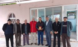 Karacasulu imama mahalle halkından anlamlı plaket