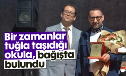 Bir zamanlar tuğla taşıdığı okula, bağışta bulundu