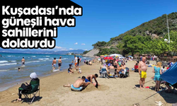 Kuşadası'nda güneşli hava sahillerini doldurdu