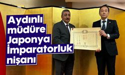 Aydınlı müdüre, Japonya İmparatorluk nişanı