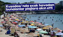 Kuşadası’nda sıcak havadan bunalanlar plajlara akın etti