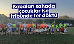 Babaları sahada çocuklar ise tribünde ter döktü