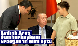 Aydınlı Aras, Cumhurbaşkanı Erdoğan’ın elini öptü