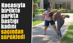 Kocasıyla birlikte parkta bastığı kadını saçından sürükledi