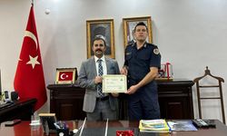 Koçarlı’da asayiş başarısına ödül: Kaymakamdan amir ve komutana başarı belgesi