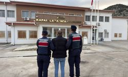 Yağma ve dolandırıcılık suçlusu Kuşadası’nda yakalandı