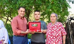 Müdür Türkoğlu'ndan gazi ailesine taziye ziyareti
