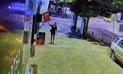 Türk bayrağını yakmaya çalışan kadın yakalandı