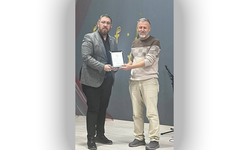 Başkan Özmen, plaketle onurlandırıldı