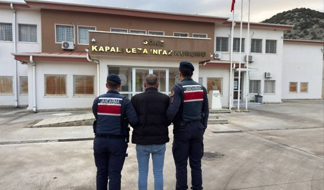 Yağma ve dolandırıcılık suçlusu Kuşadası’nda yakalandı