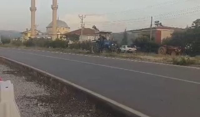 Karacasu'da karayolları yapmayınca vatandaş yaptı: Traktörüyle orta refüjü temizledi