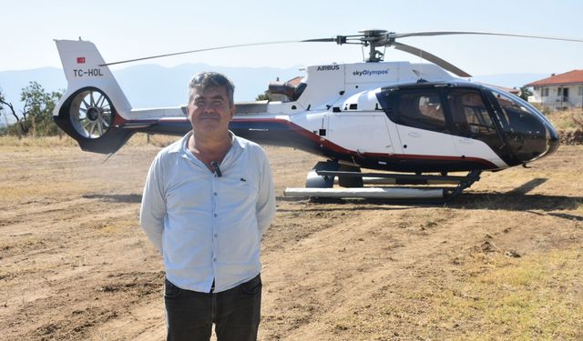 Karacasu’ya iniş yapan iki helikopter merak konusu oldu: Vatandaşlar maç izler gibi izledi