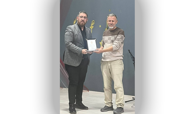 Başkan Özmen, plaketle onurlandırıldı