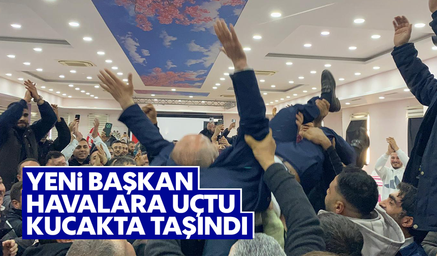 Yeni başkan havalara uçtu, kucakta taşındı