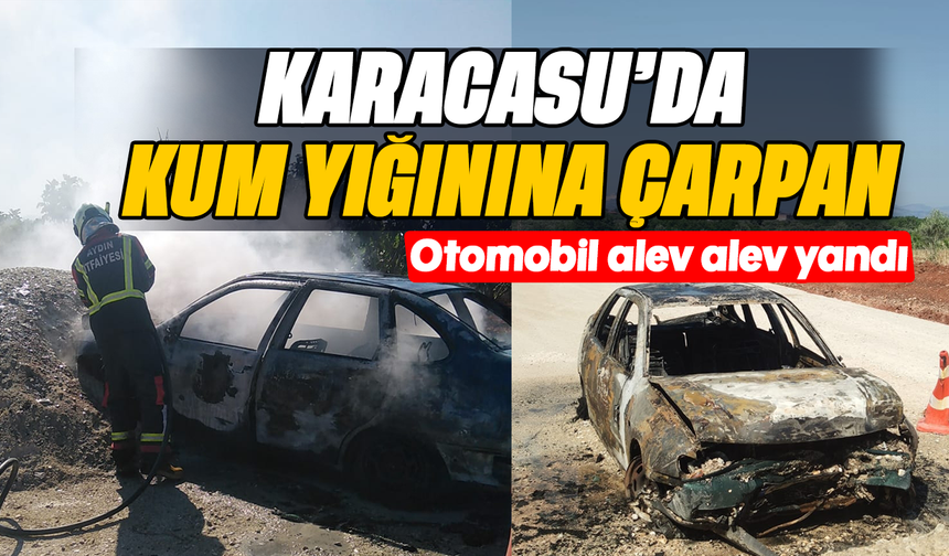 Karacasu'da kum yığınına çarpan otomobil alev alev yandı